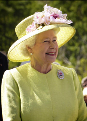 Queen Elizabeth the second dressed in yellow